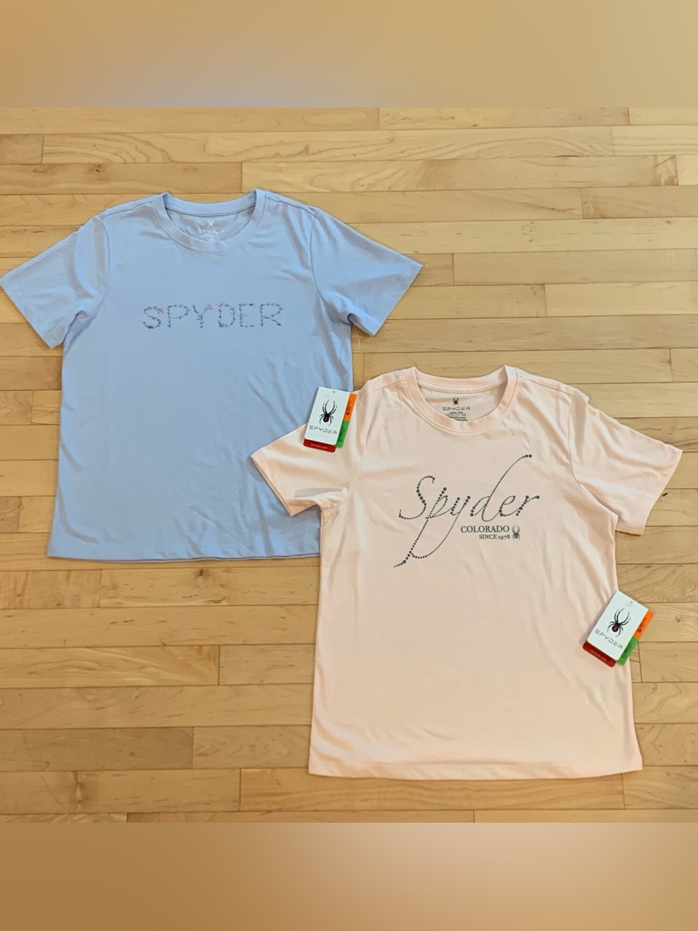 2 NEW Spyder Women’s Graphic Tees – Size Small – NWT (Mist Blue + Peach Blush)